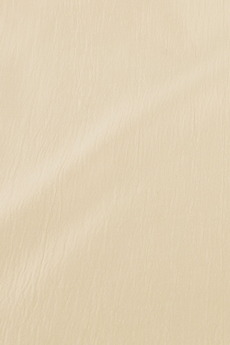 Beige shiny dress with ruffles | My Jewellery