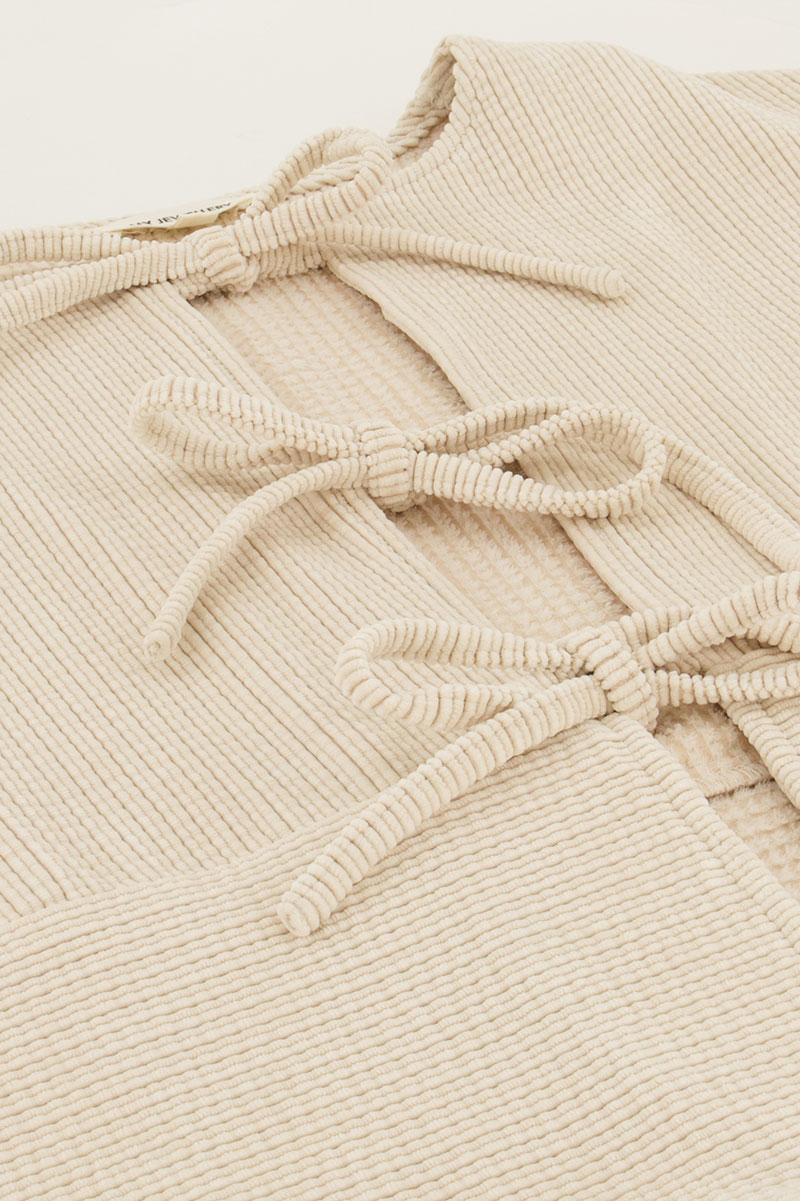 Beige corduroy top with bows | My Jewellery