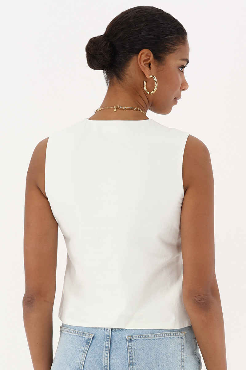 Beige gilet with bows | My Jewellery