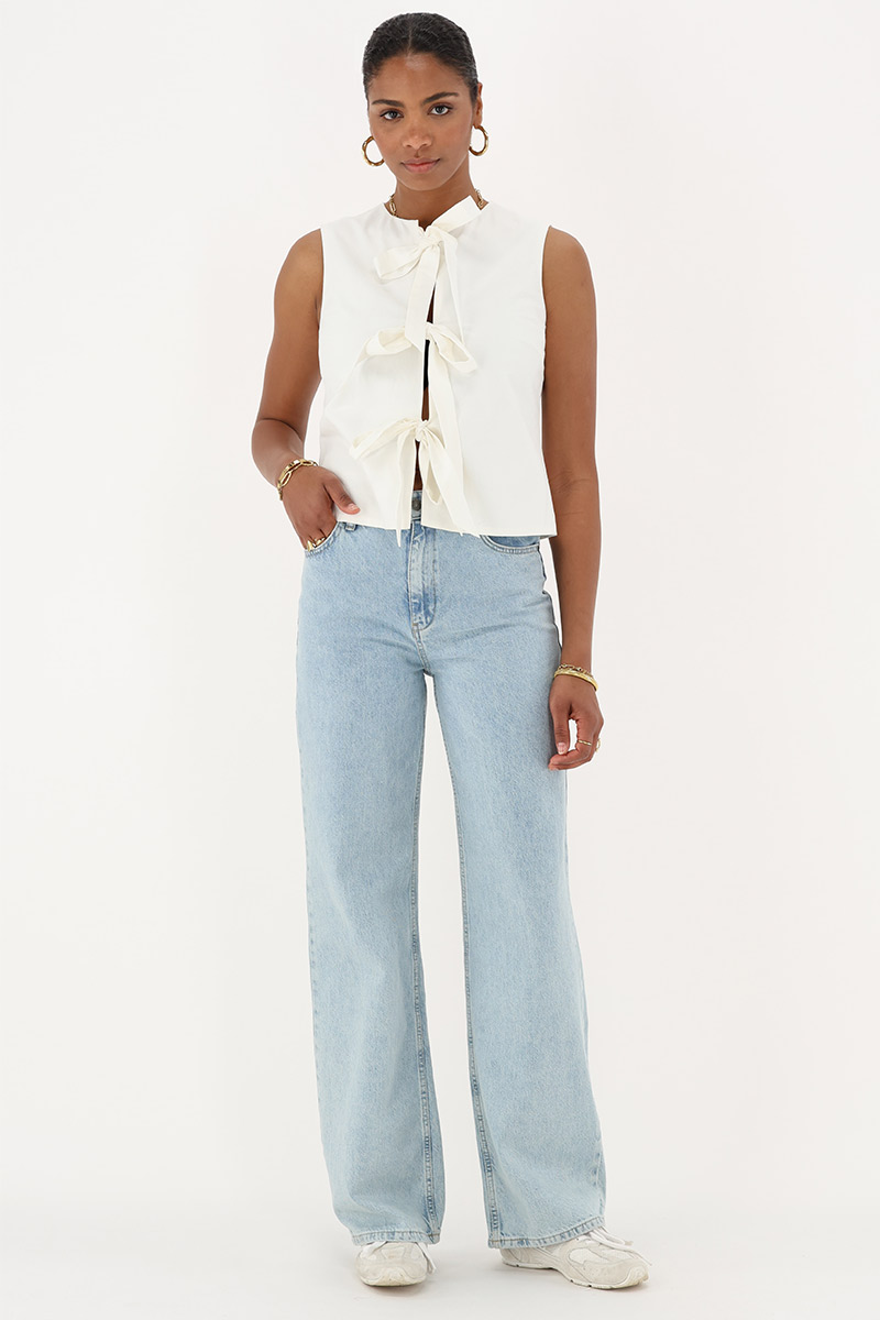 Beige gilet with bows | My Jewellery