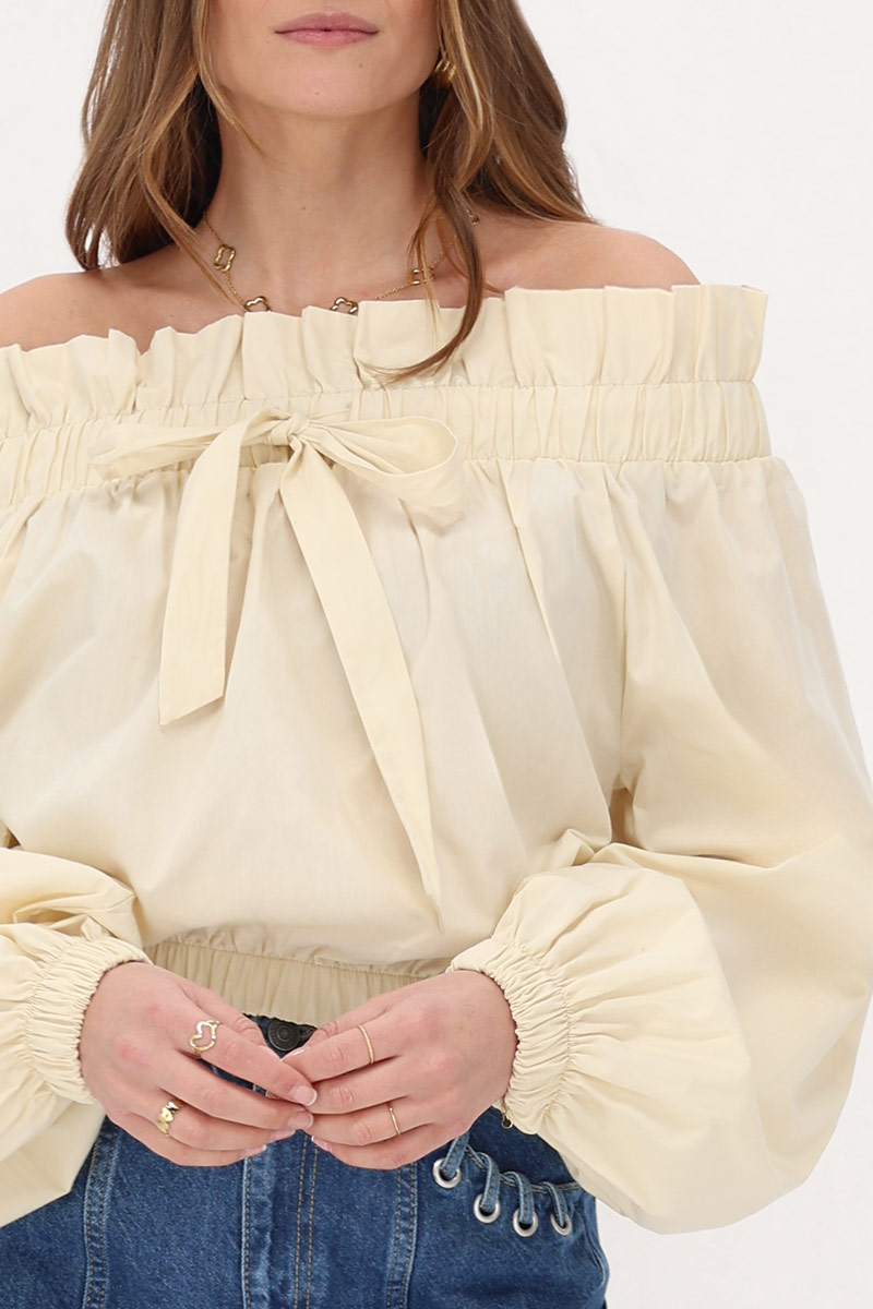 Beige off-shoulder top with ruffle and bow | My Jewellery