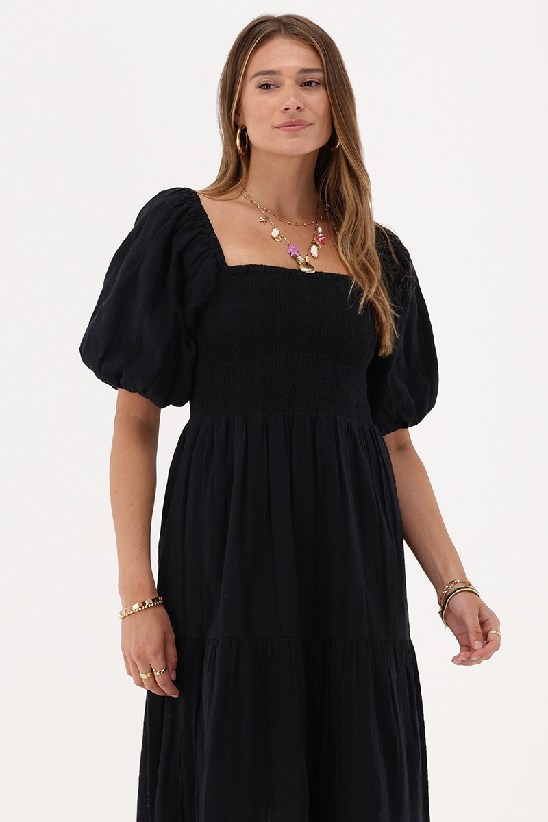 Black maxi dress with smock and puff sleeves