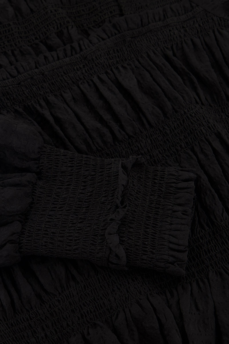 Black smock top with ruffles | My Jewellery