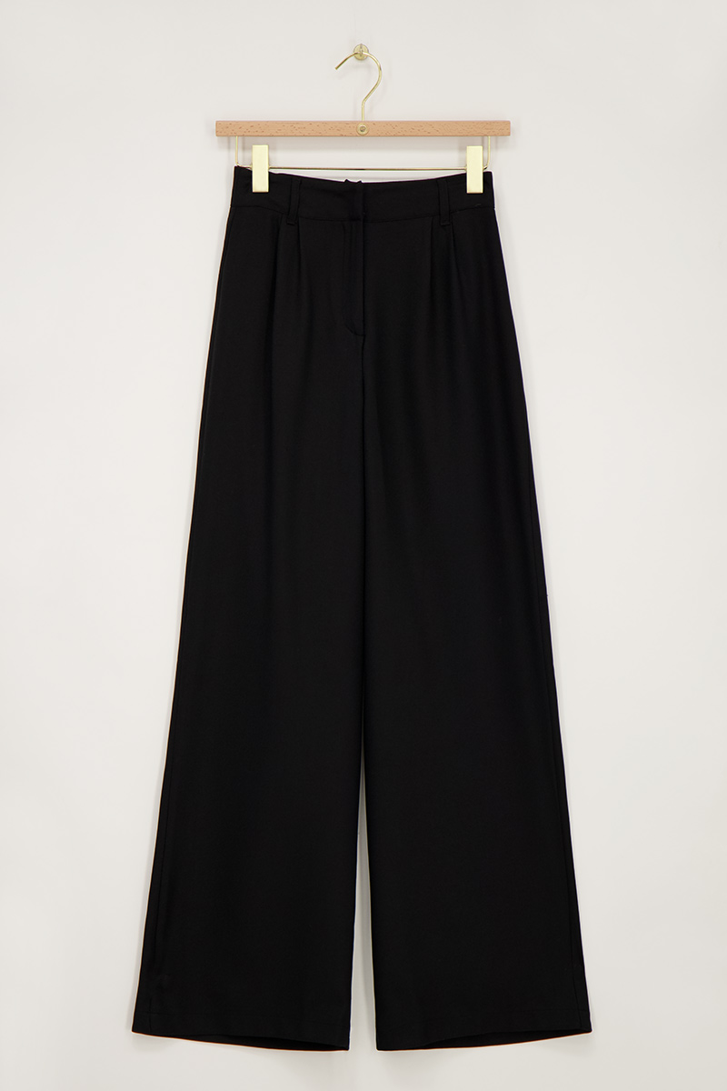 Black wide leg trousers with hidden button | My Jewellery