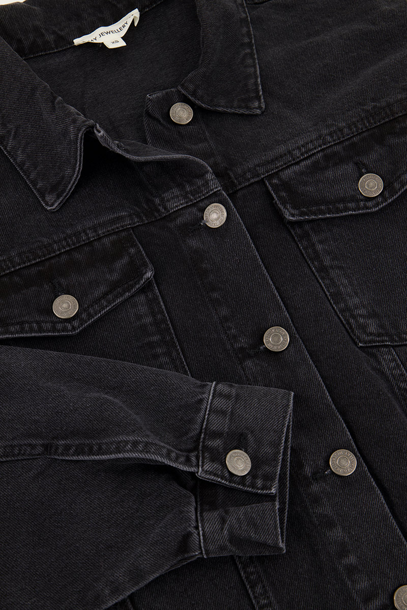 Black denim jacket with ruffles