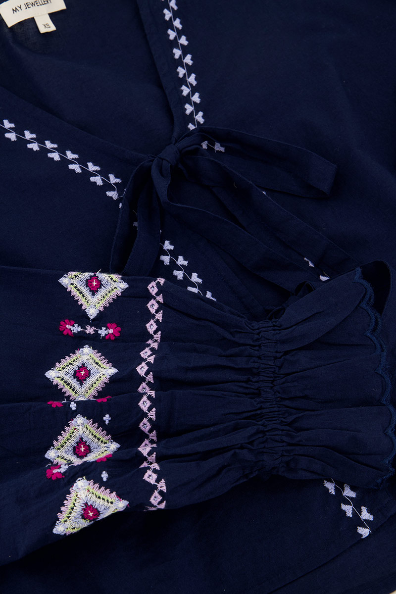 Blue top with bows & embroidery details | My Jewellery
