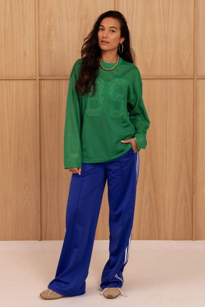 Dunkelblaue weite Jogginghose mit Streifen