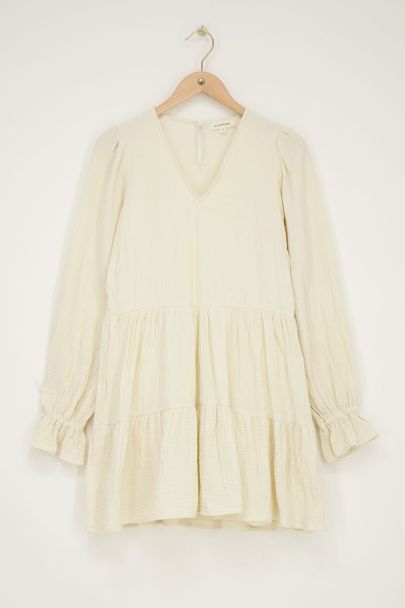 Beige jurk met elastische mouwen