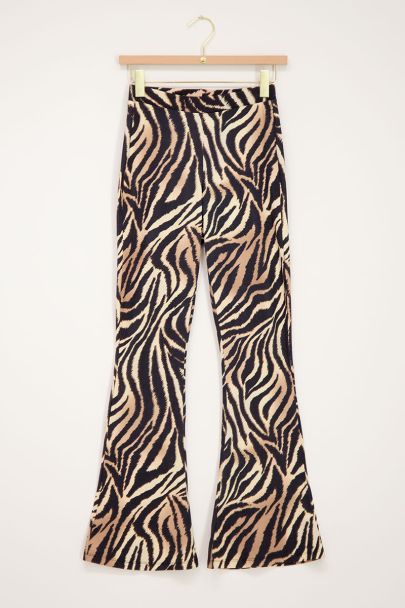 Beige zebra print flared trousers