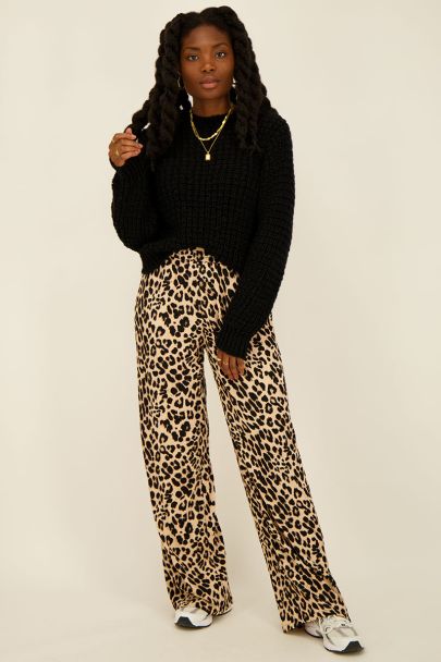 Distressed Black and Cheetah Animal Print Jeans with Feathered Seams – Être  Chic Boutique