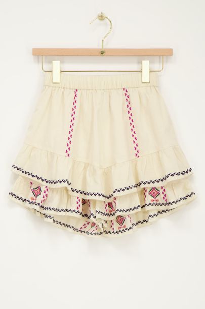 Beige skort with embroidery details