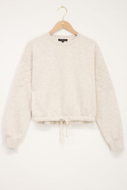 Beige sweater met ruitpatroon