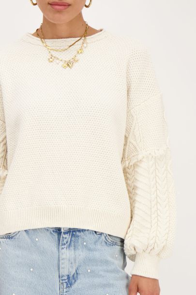 Beige sweater with jacquard sleeves