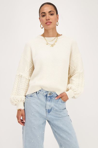 Beige sweater with jacquard sleeves