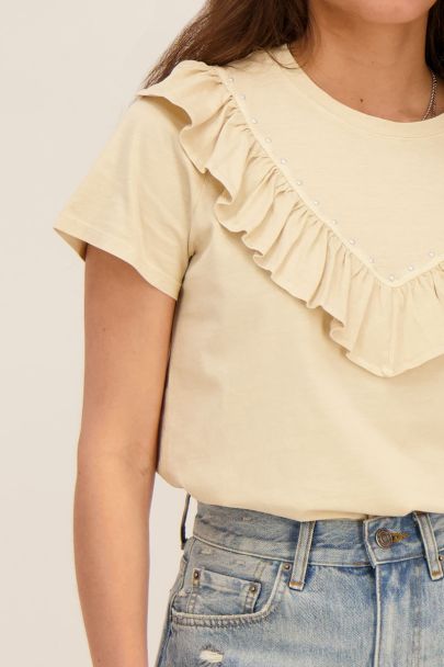 T-shirt beige avec volants et clous