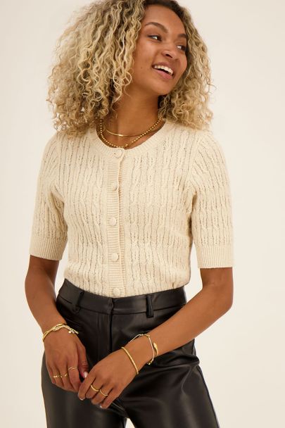 Beige vest met kabels & knopen