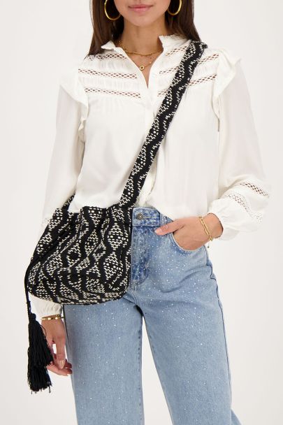 Black and white round shoulder bag with woven Aztec print