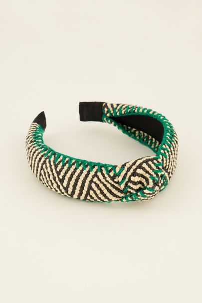 Zwart-wit gestreepte haarband met groene stiksels