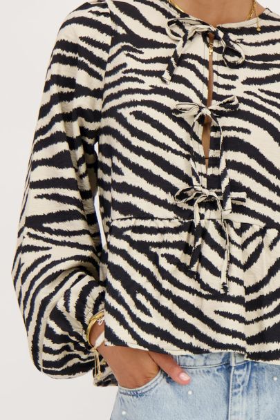 Zwarte-beige zebra top met strikjes