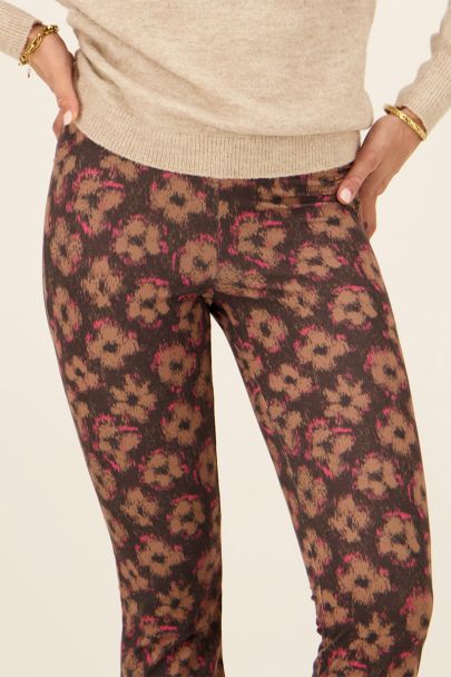 Black flared trousers with brown & pink floral print