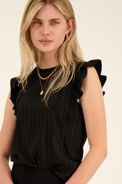 Black ruffled top with structure