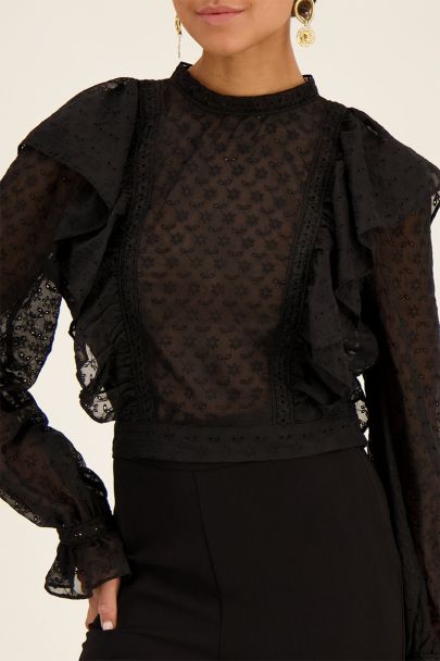 Zwarte doorschijnende blouse met ruffles