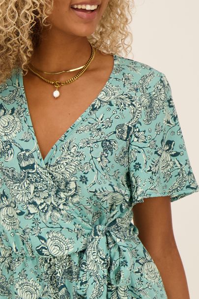 Blauwe bloemenprint playsuit met ruffles