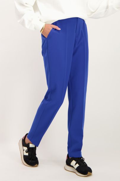 Blauwe pantalon met persvouwen