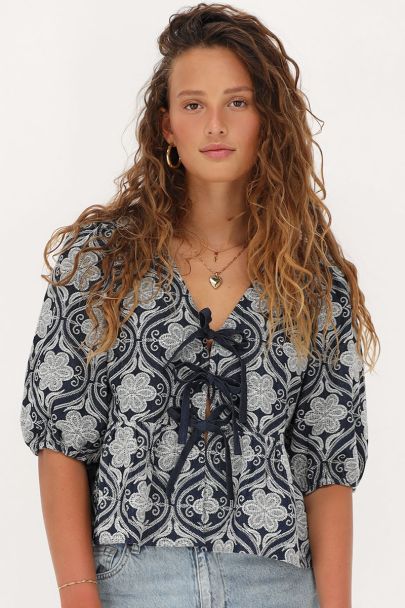 Blue chambray top with floral embroidery