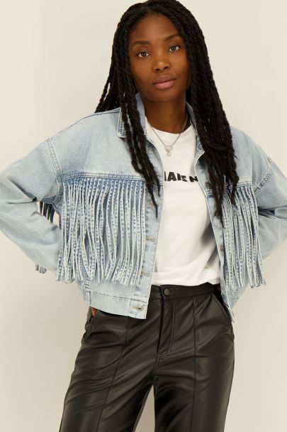 Veste en jean bleu à franges