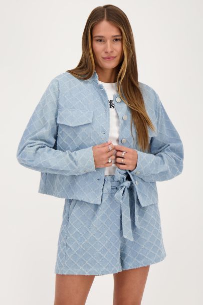Blaue gewebte Denimjacke