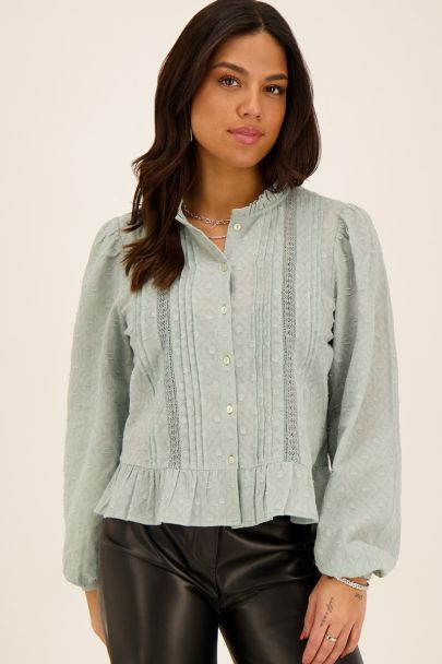 Blauwe jacquard blouse met ruffles