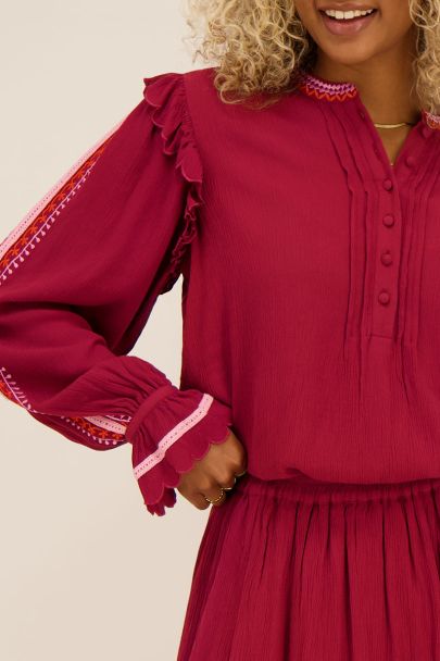 Bordeaux red blouse with embroidered trim