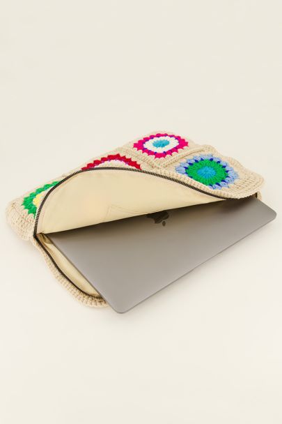 Laptop sleeve with hand-knit flowers