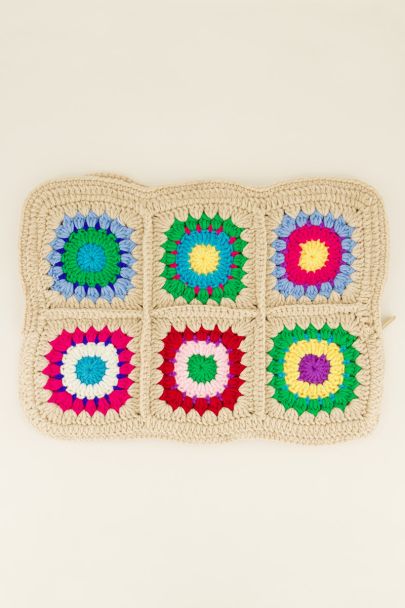 Laptop sleeve with hand-knit flowers