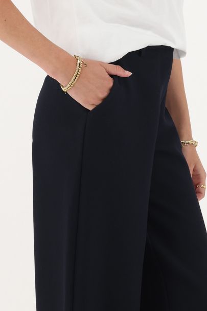 Donkerblauwe wide leg pantalon met steekzakken