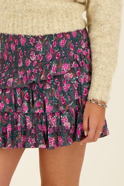 Dark green ruffled skirt with pink floral print