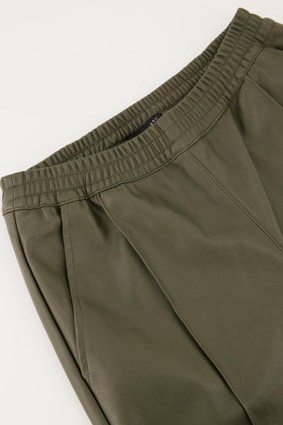 Dark green leather-look trousers