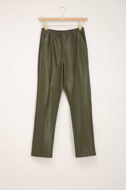 Dark green leather-look trousers