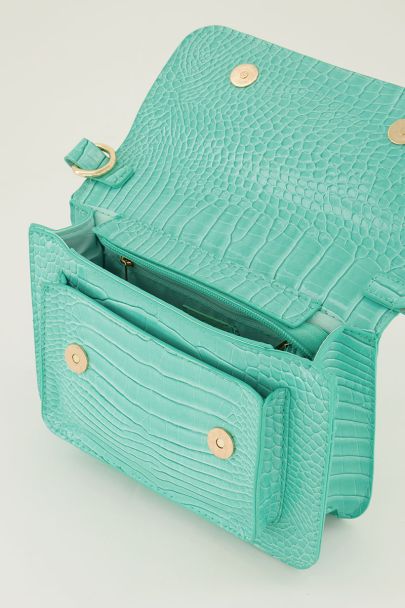 Sac à bandoulière turquoise avec imprimé croco