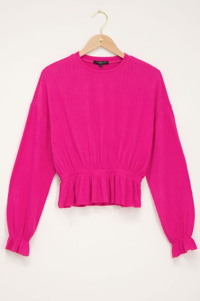 Fuchsia top met structuur & peplum