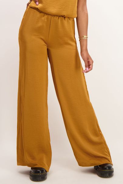Yellow satin look trousers