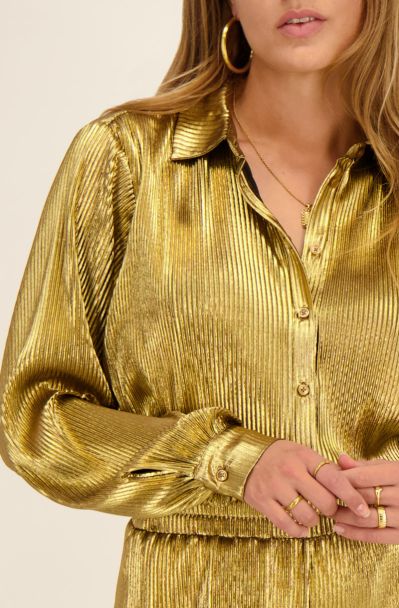 Goldene Faltenbluse