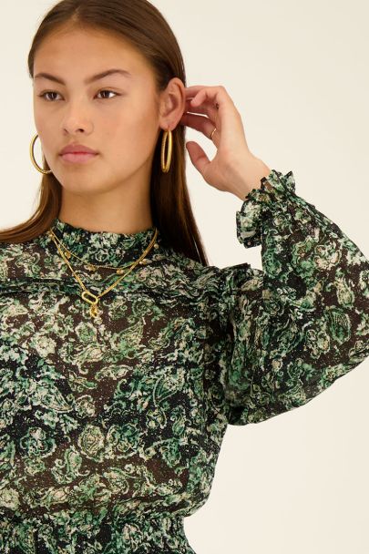 Robe verte à imprimé coloré et volants