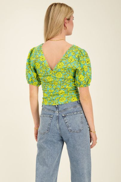 Groene top met bloemenprint & pofmouw