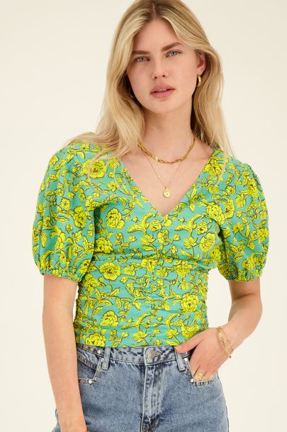 Green floral print top with puff sleeves
