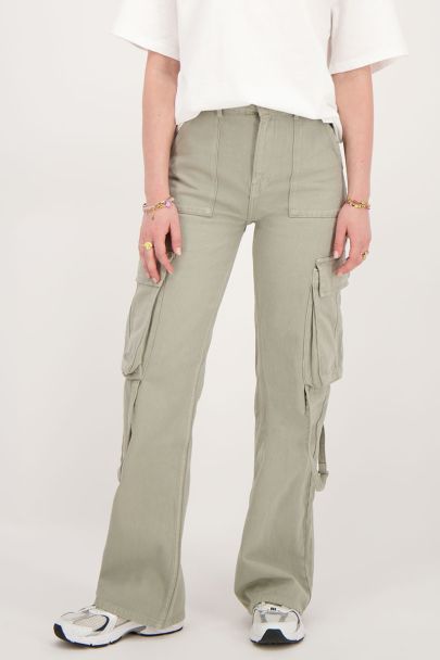 Green jeans with cargo pockets