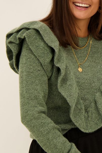 Green sweater with ruffled layers