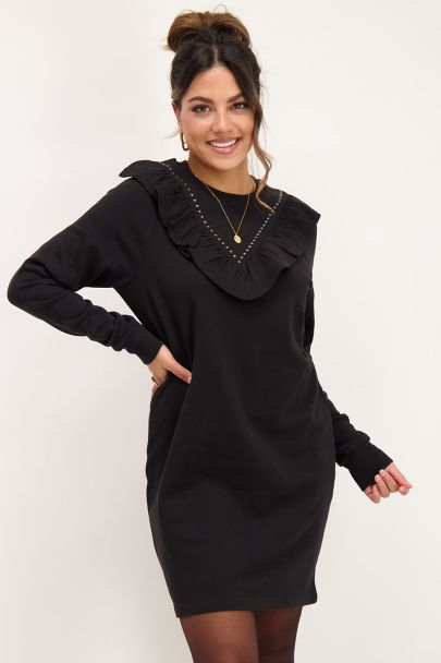 Black sweater dress with studs
