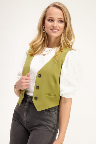 Green gilet with buttons